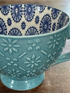 Teal Signature Housewares Embossed Stoneware Mug with Blue Patterned Interior